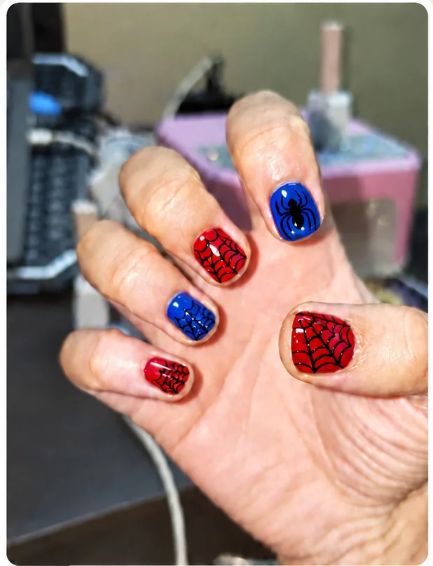 Red and blue Spider-Man nail art